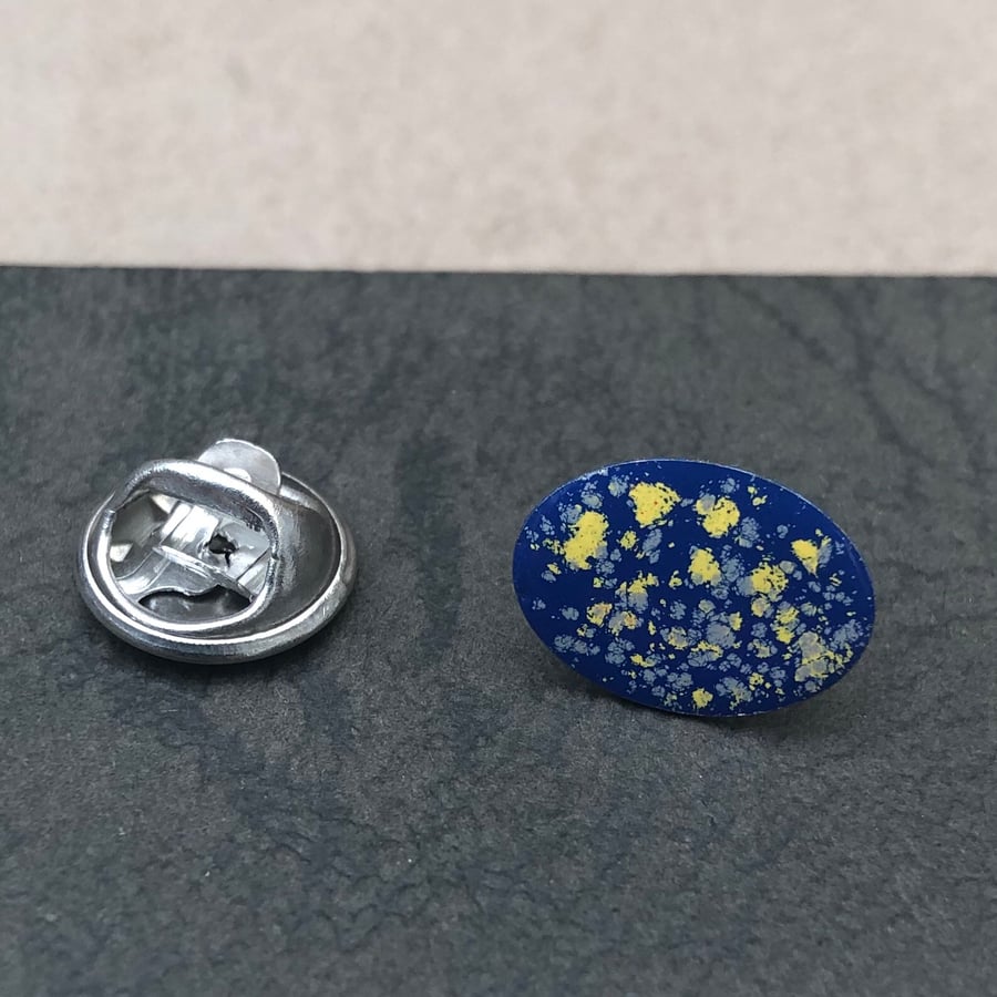 Hand enamelled lapel pin. Blue & yellow mix