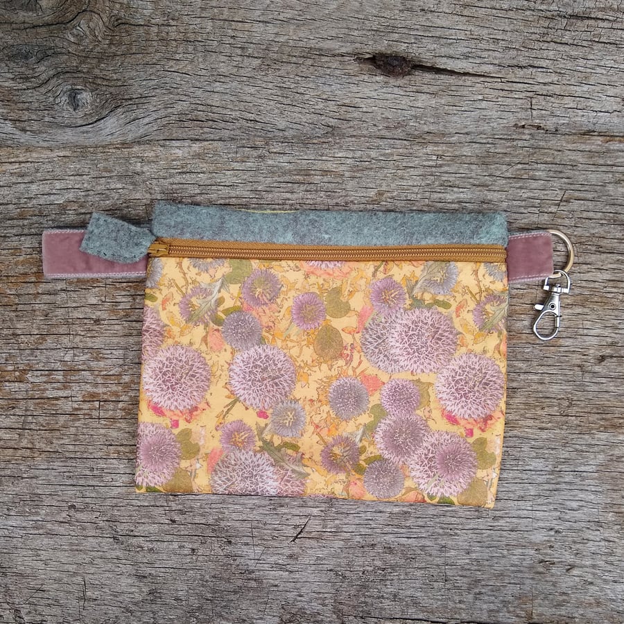 Floral zip pouch with swivel clip