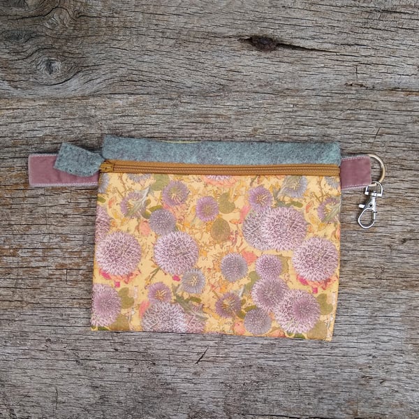 Floral zip pouch with swivel clip