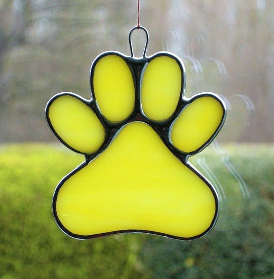 Stained Glass Window suncatcher (Paw Print) in yellow and white opalescent glass
