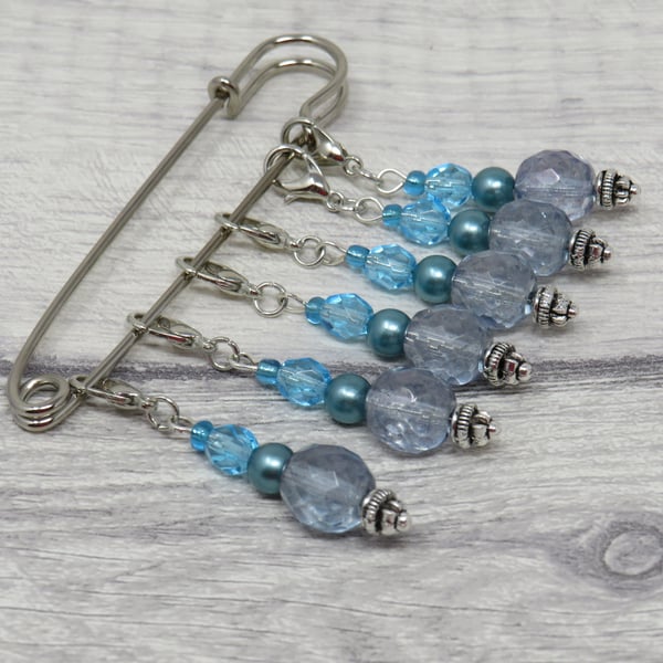 Blue beaded stitch markers