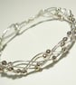 Metal Beaded Twist Bangle - Image 2