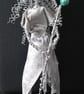 Druid  with velor dress and beads 