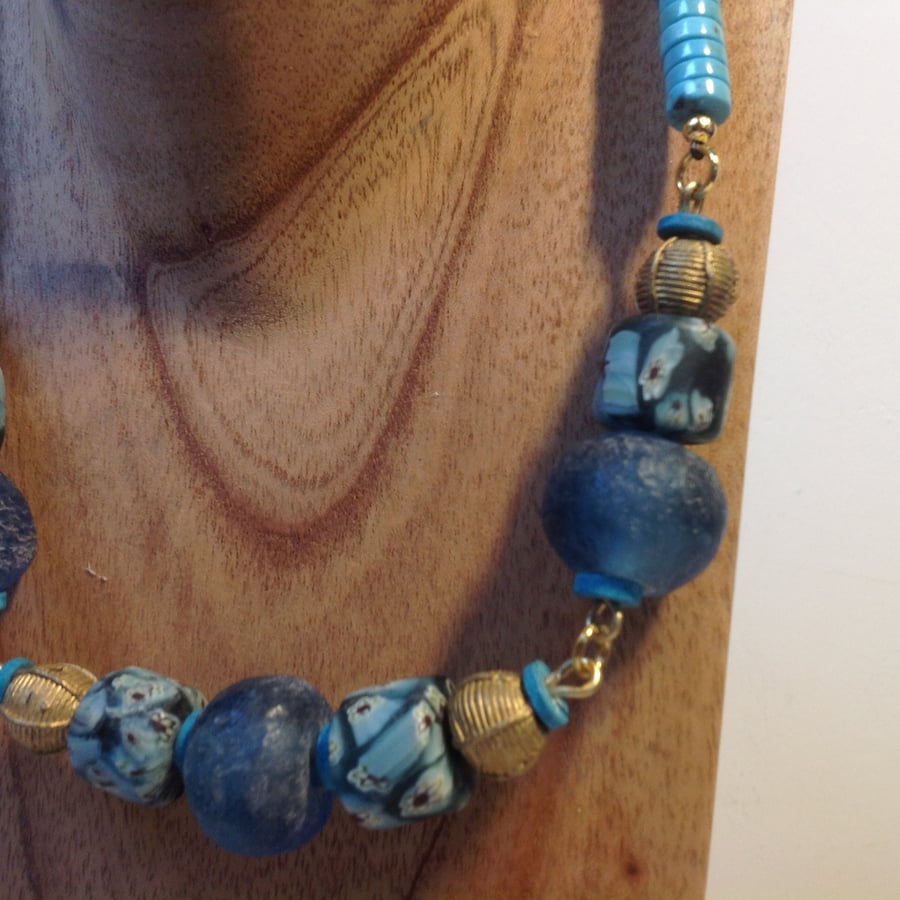 Necklace with millefiori beads and recycled brass and glass beads from Ghana