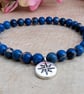 Blue sea sediment jasper stretch bracelet with North Star charm - Image 2