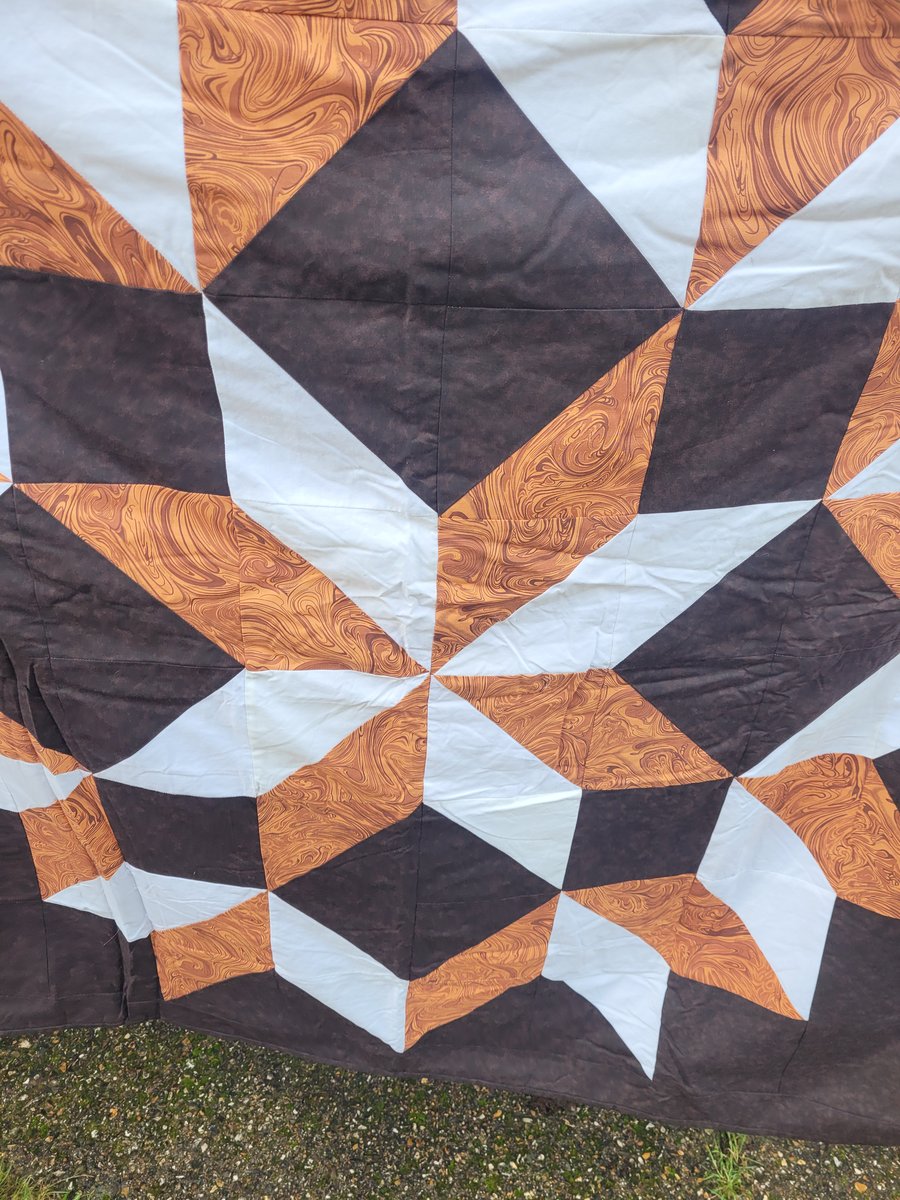 Homemade Brown star patchwork quilt