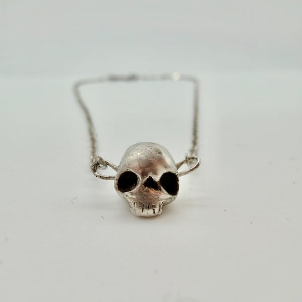 After Hours. The Silver Skull necklace