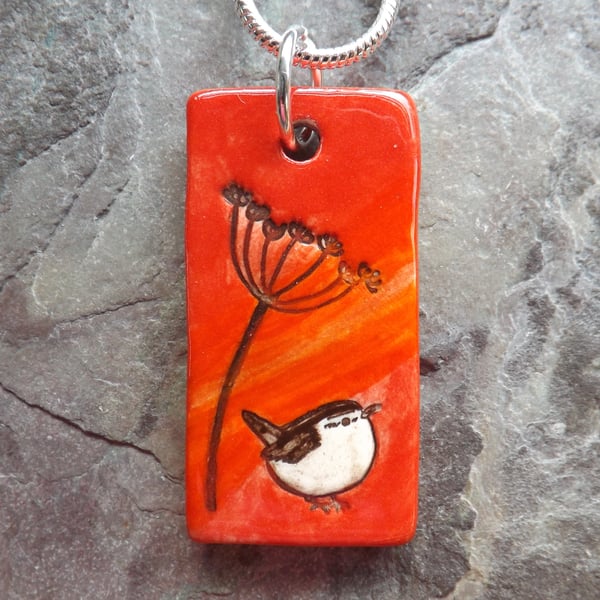 Handmade Ceramic Wren under Cow Parsley pendant in red, flame orange and brown