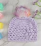 Lilac Crochet Baby Hat Newborn to 3 Months with Bobble Flower and Pastel Pom  - Image 1