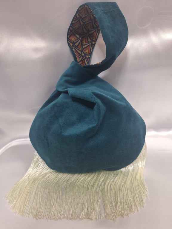 Teal Velvet Japanese knot bag with 9cm tassel trim and geometric pattern lining