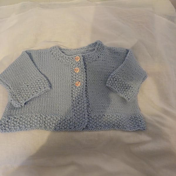 Blue, 100% wool, handknit baby cardigan.