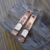 Copper and silver 'winter sun' mixed metals scene drop earrings