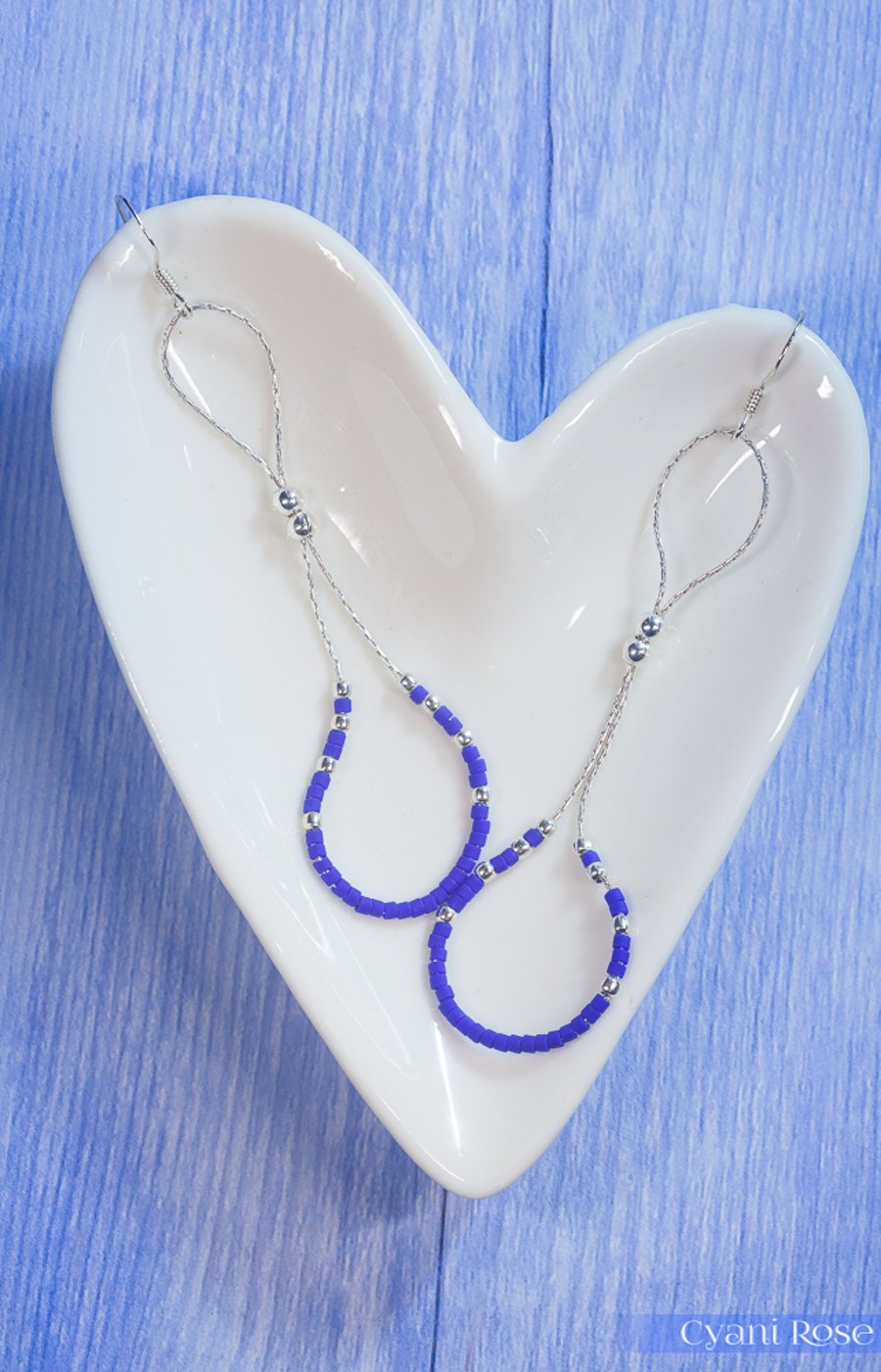 Drop earrings with silver chain, beads and dark blue seed beads 