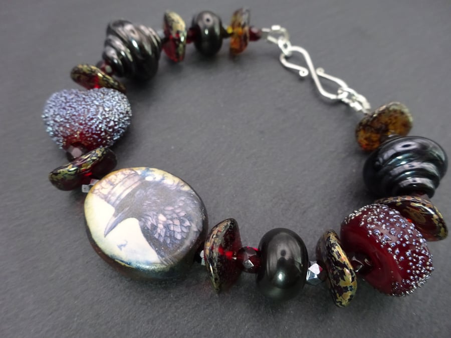 raven king lampwork glass beaded bracelet