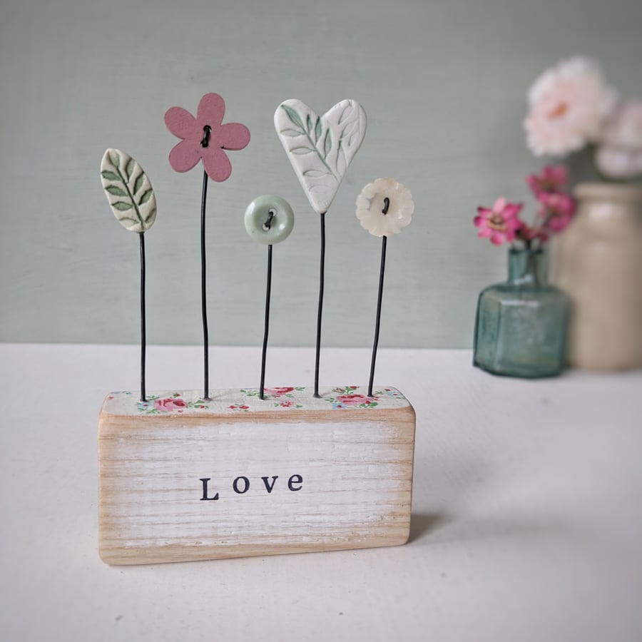 Heart and Button Flowers in a Painted Wood Block 'love'