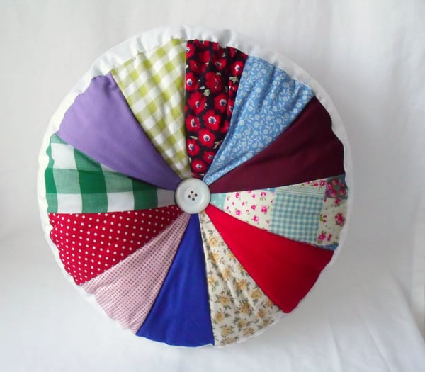 big circular chunky accent cushion, multi coloured pin wheel pillow, 13 inches