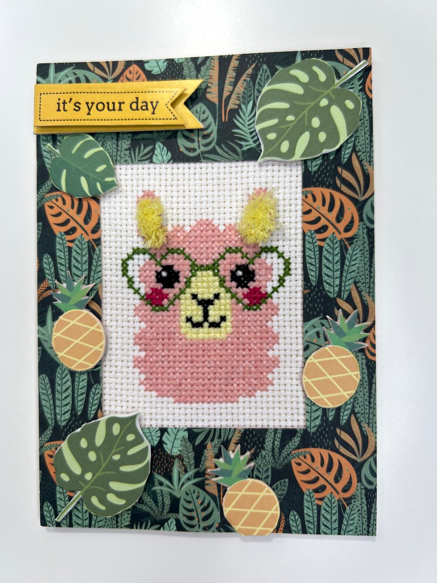 Green lama or alpaca with green glasses