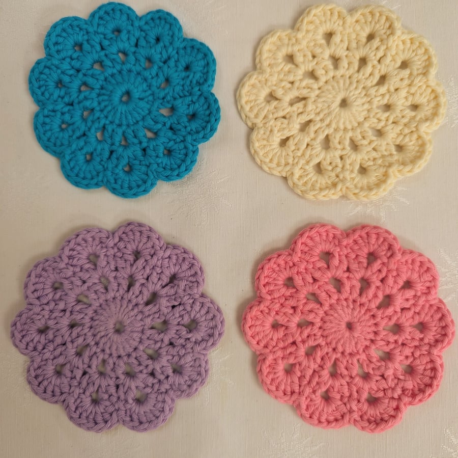 Set of 4 crochet coasters in pink, lilac, turquoise and pale yellow