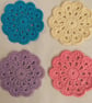 Set of 4 crochet coasters in pink, lilac, turquoise and pale yellow