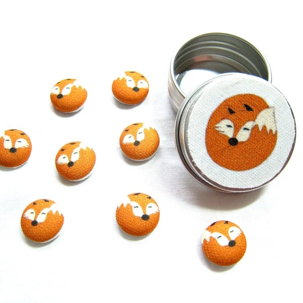 Fox sleeping and curled fridge magnets 8 in a tiny tin. Lovely gift.