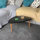 Black 'Fitter Happier' Coffee Table with Tapered Legs 