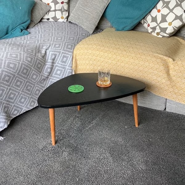 Black 'Fitter Happier' Coffee Table with Tapered Legs 