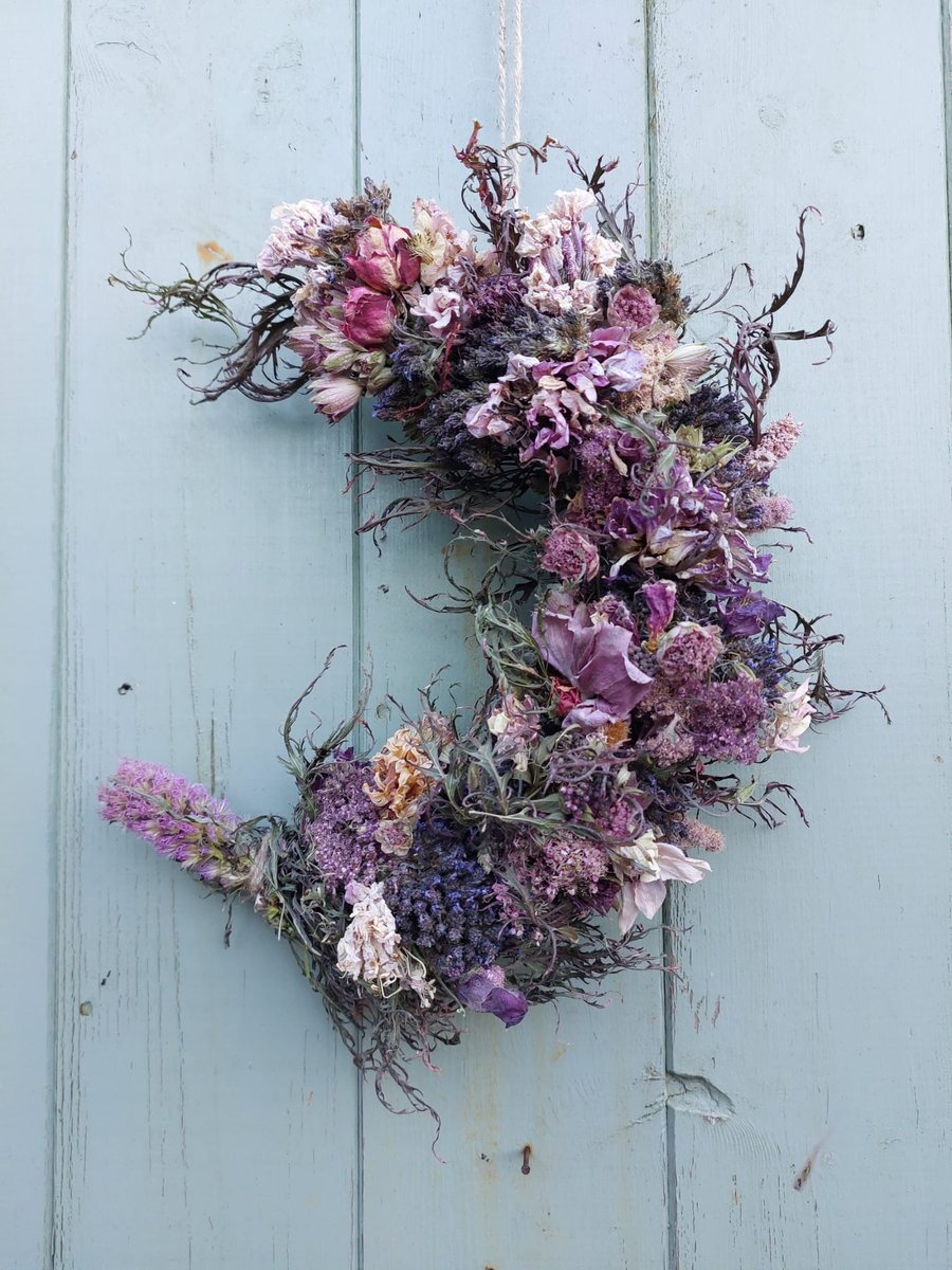 Dried Flower Crescent Moon Shape Wreath. Shades of Purple and Pink.