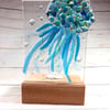 jellyfish in oak base, fused glass panel