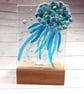 jellyfish in oak base, fused glass panel