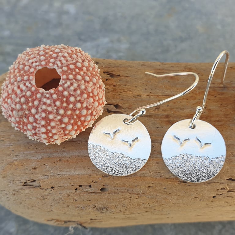 Silver beach themed earrings with seagulls