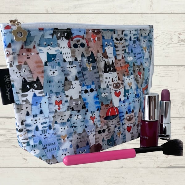 Makeup bags blue cats with red hats 