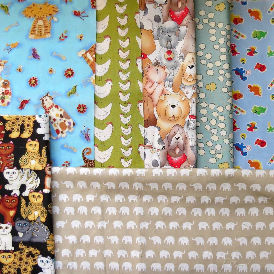Fabric destash!  A bundle of 7 good size pieces of cotton fabric.  Animals.