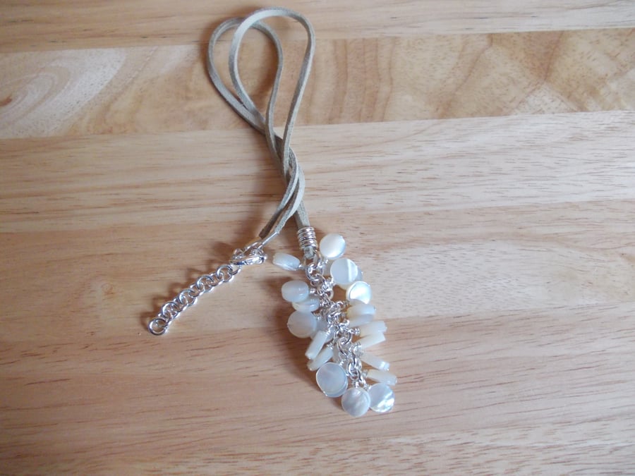 Cream shell coin cluster pendant necklace