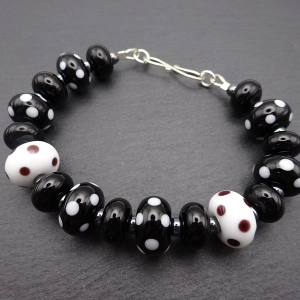 lampwork glass bracelet, sterling silver black polka dots