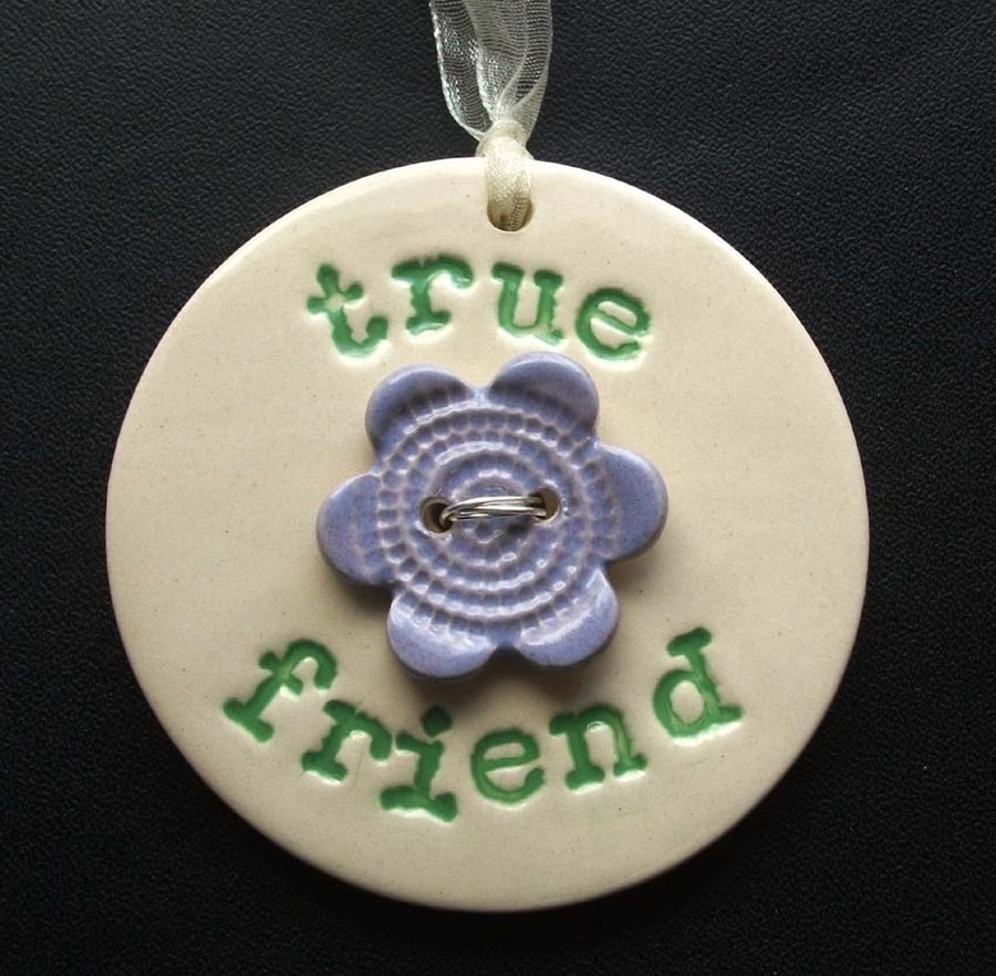 Ceramic decoration with flower button True Friend