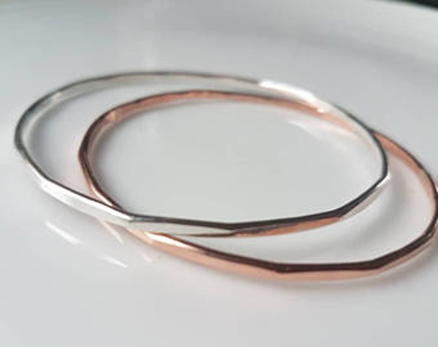 Copper bangle stacking with multi edged finish, sterling silver available too