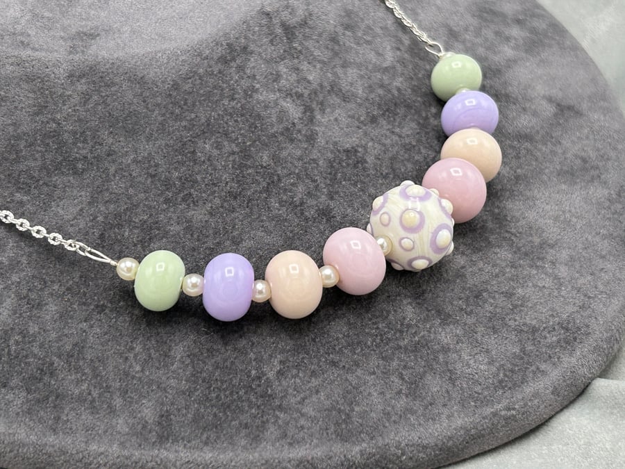 pastel pink, green, cream and purple lampwork glass beaded necklace