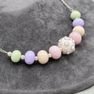 pastel pink, green, cream and purple lampwork glass beaded necklace