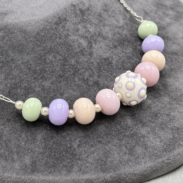 pastel pink, green, cream and purple lampwork glass beaded necklace