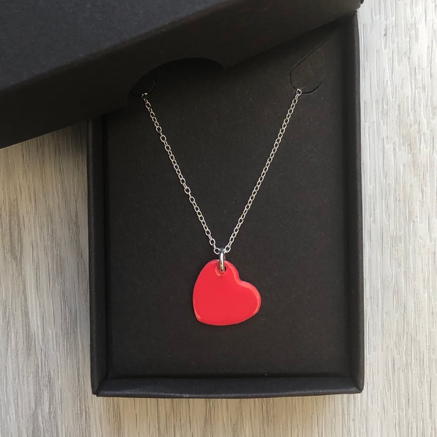 Coral red enamel heart necklace