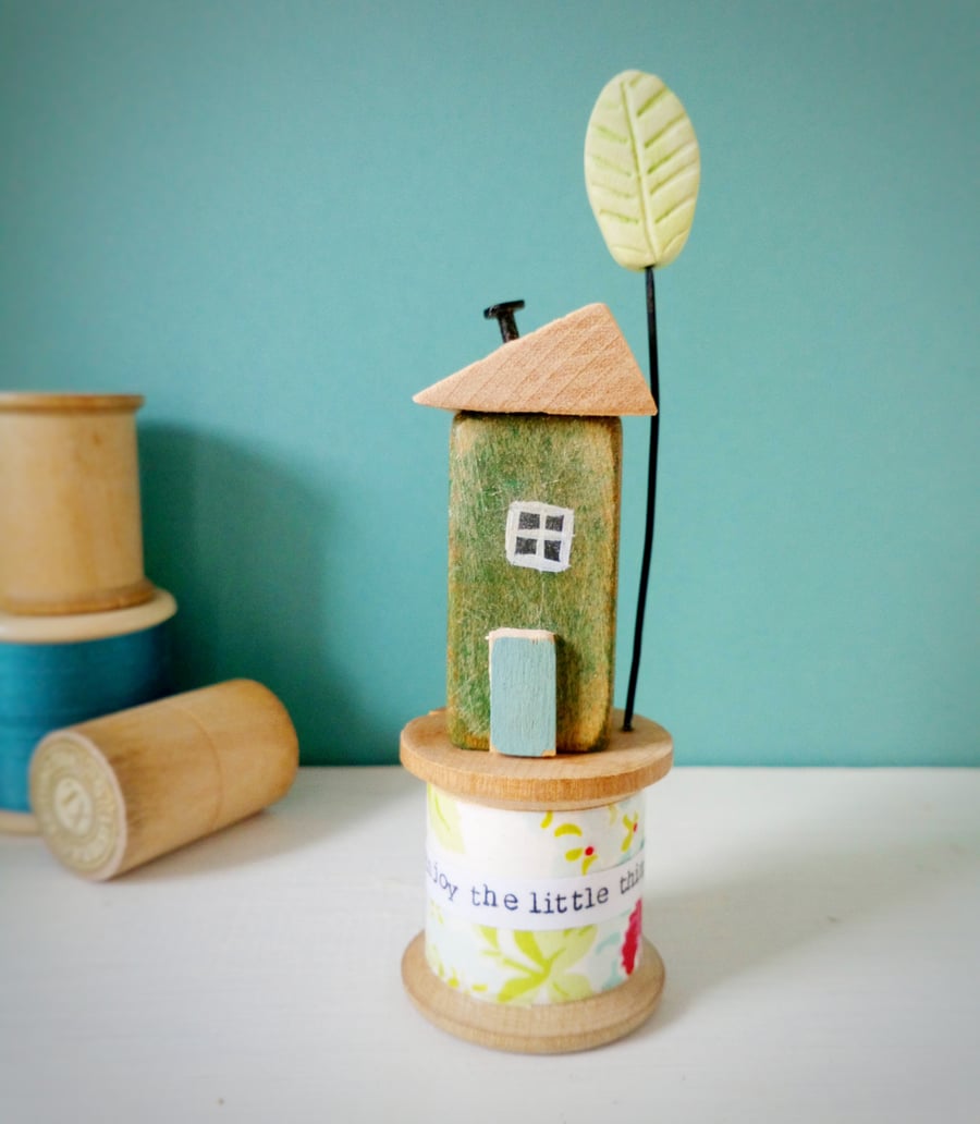 Little house with clay tree on vintage bobbin 'enjoy the little things'