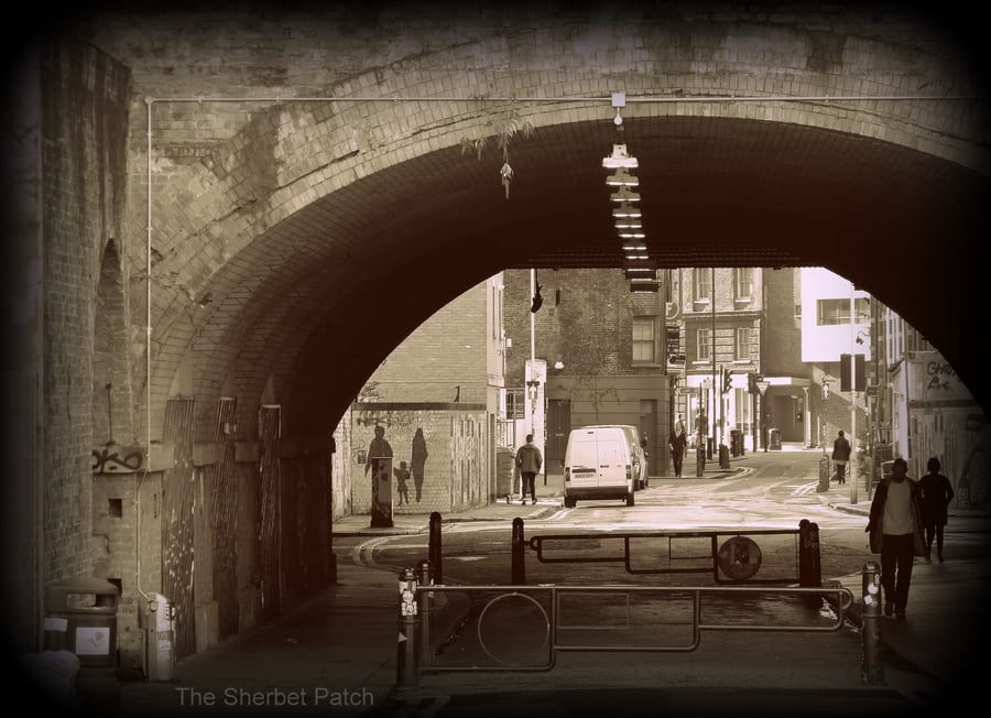 Under the archway,  Shoreditch.  A photographic print.