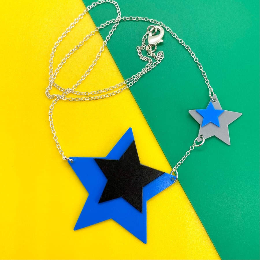 80’s vibe blue, grey and black star necklace