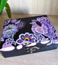 Wooden keepsake box handpainted with an ornamental bird and flowers.  