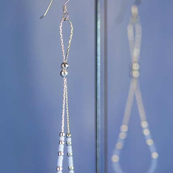 Light blue long dangle earrings with silver chain, beads and seed beads 