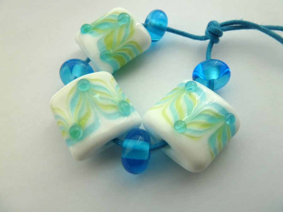 blue and green stripes handmade lampwork glass beads