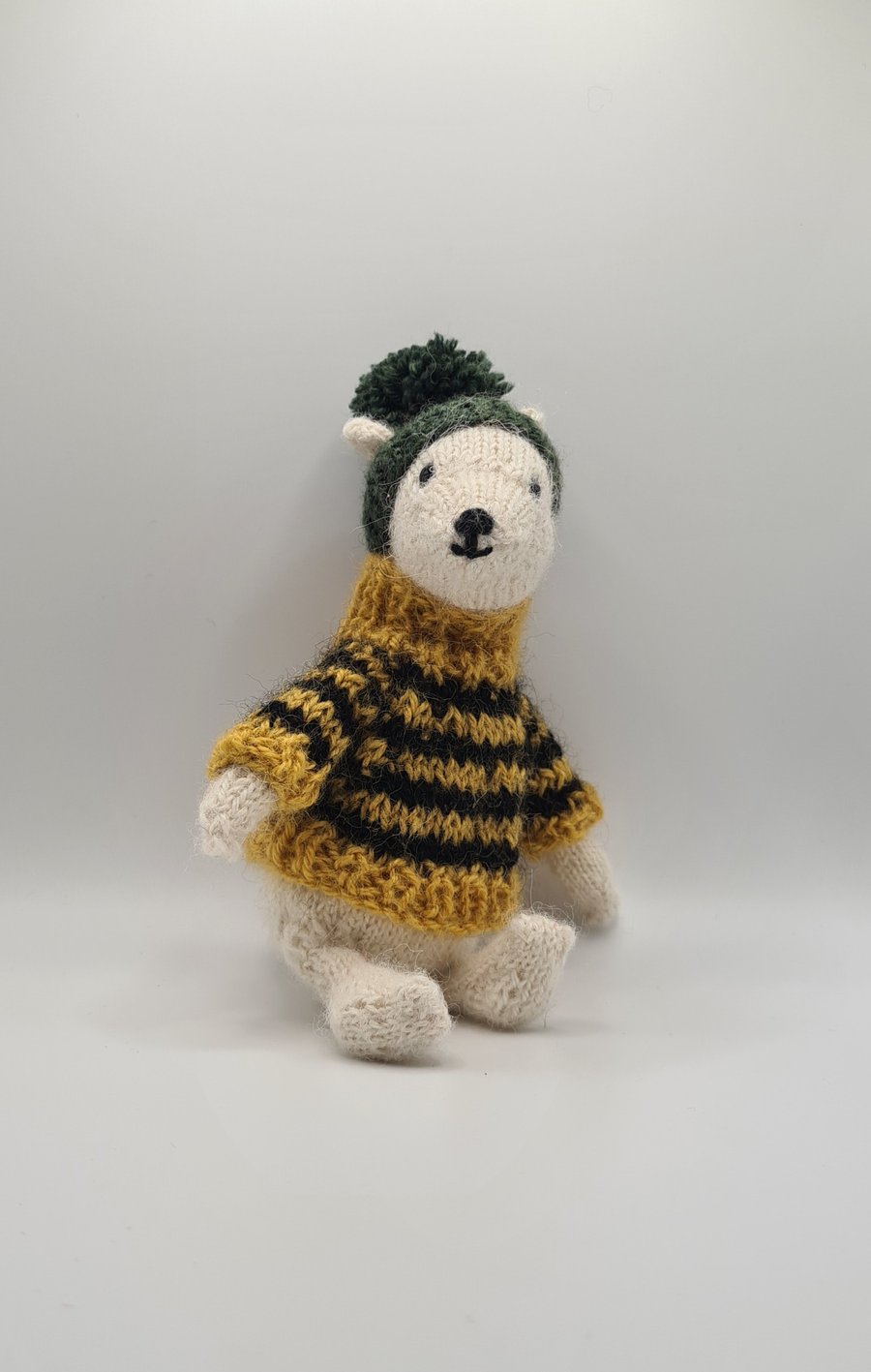 Sitting knitted Polar Bear