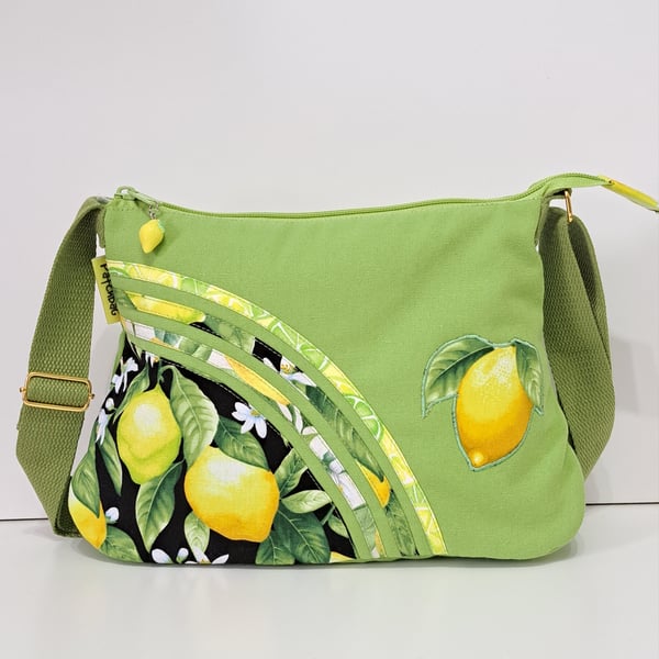 Green handbag with lemons
