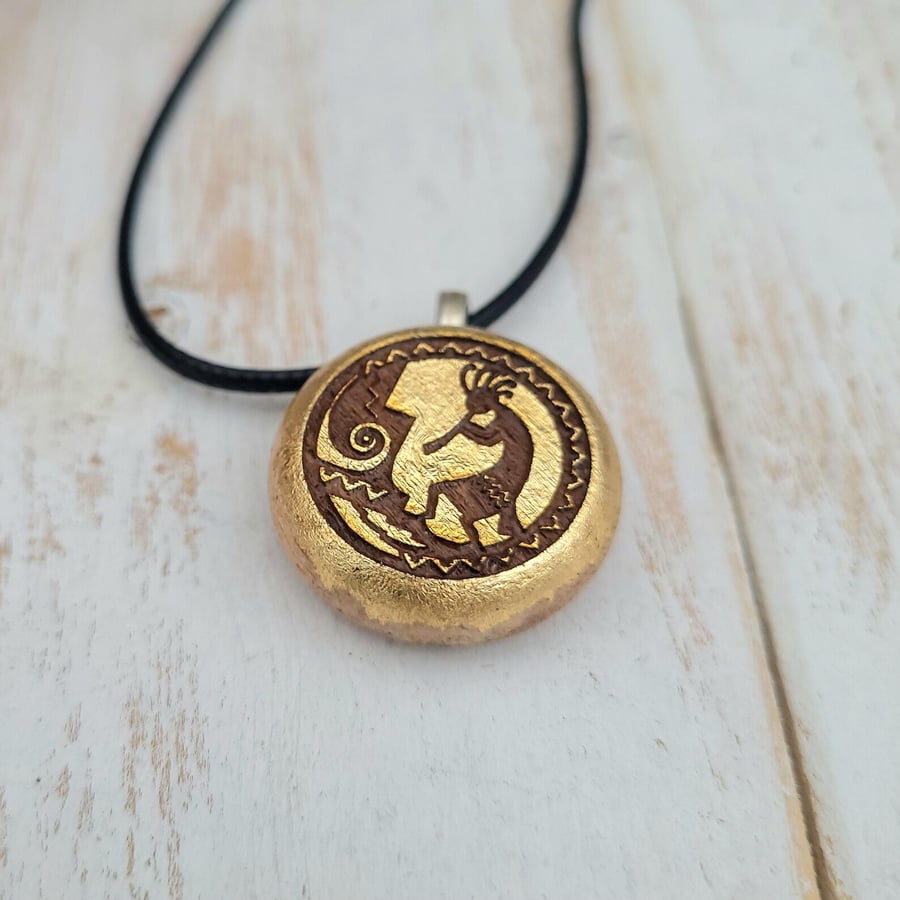 Kokopelli Pendant - Handmade Beechwood Necklace with 22k Gold Leaf Front