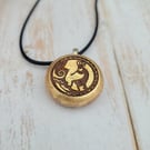 Kokopelli Pendant - Handmade Beechwood Necklace with 22k Gold Leaf Front